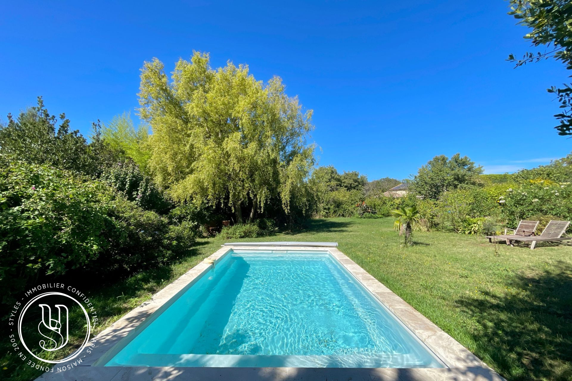 Uzès - nearby, an old farmhouse, its beautiful garden, and its outbui - image 10