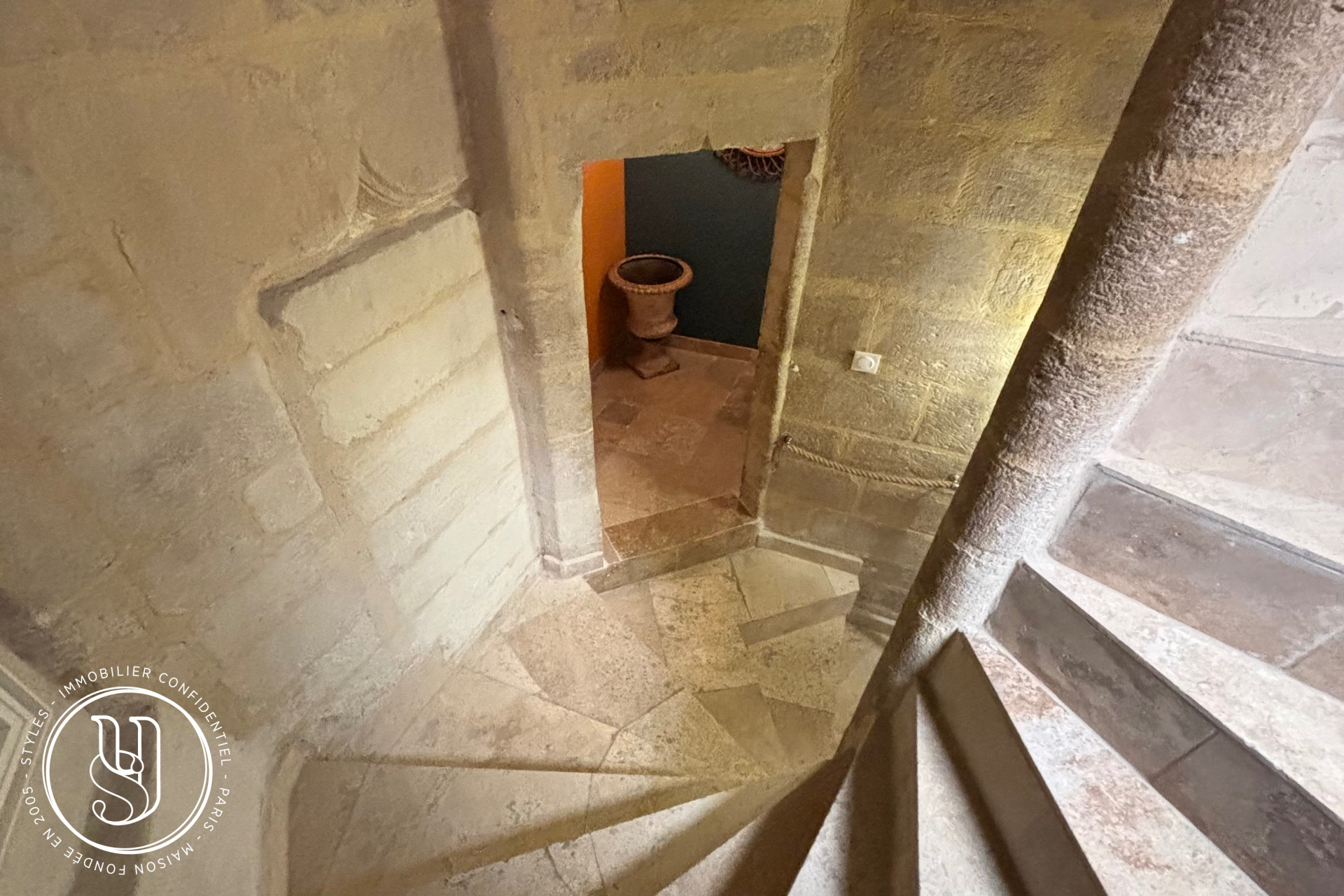 Uzès - at the entrance of the Place aux Herbes - image 3