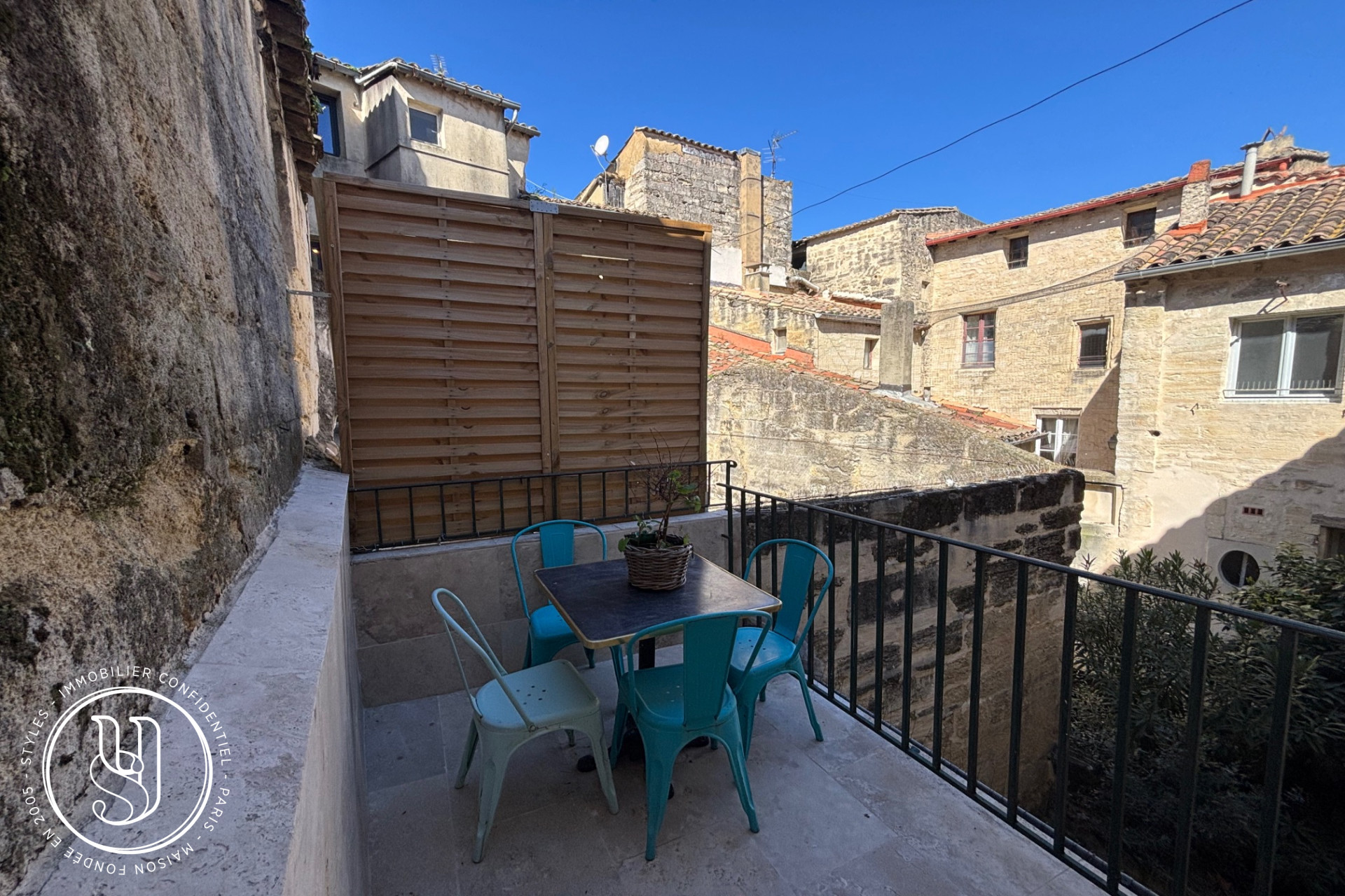 Uzès - at the entrance of the Place aux Herbes - image 4